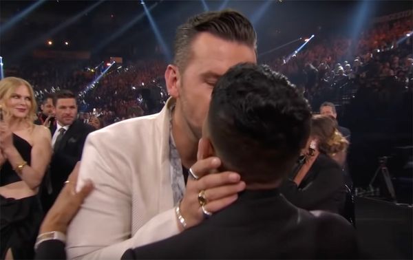 Watch: T.J. Osborne's Celebratory Smooch Marks First Same-Sex Kiss at the CMAs